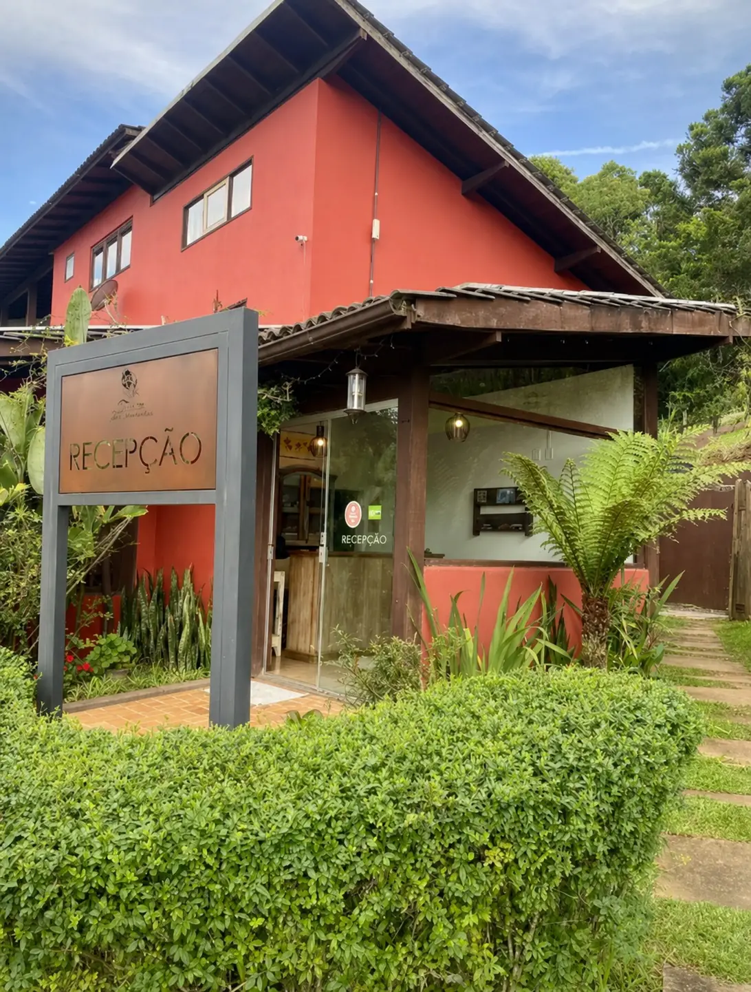 Recepção da Pousada Jardim das Montanhas, em Monte Verde